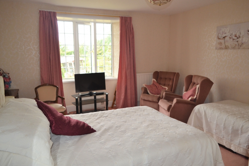 family room with en suite bathroom fridge, Tv , Guests can return at any time if they wish